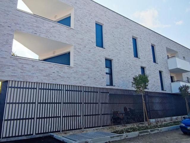 Appartement T2 42m2 avec terrasse et place de parking