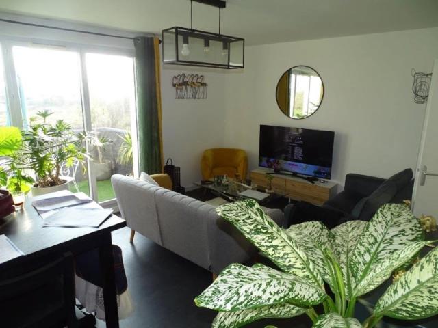 Appartement T2 49 m², terrasse, 3 parkings couverts