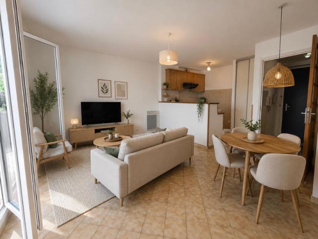 APPARTEMENT T2 AVEC TERRASSE ET PARKING A 2 PAS DU CENTRE VI