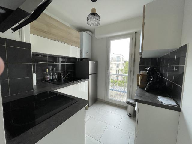 Appartement T2 de 46 m2 avec balcon, cave et parking en sous sol