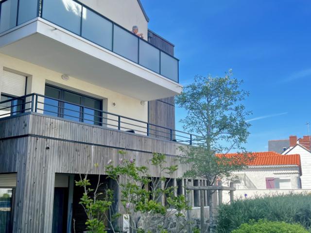 Appartement T2 loué avec balcon 2 places parking À 600 m de
