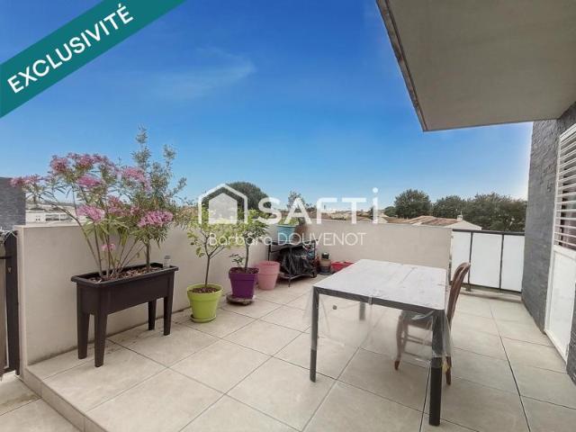 Appartement T4 avec grande terrasse, cellier, parking et jardin partagé