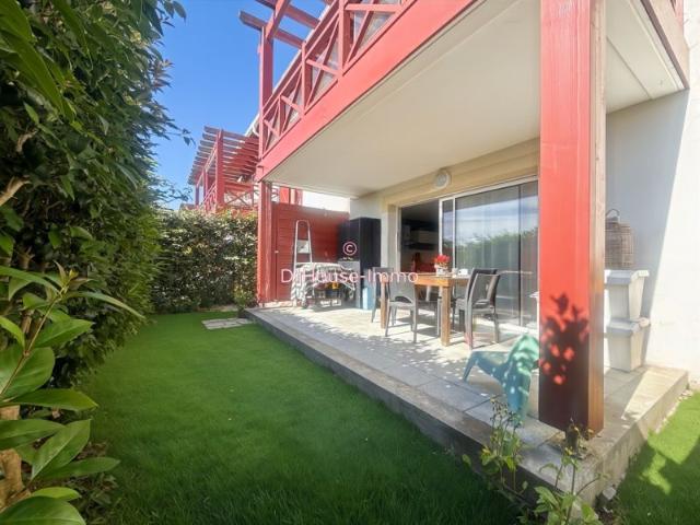 Appartement T4 avec jardin, cave et parkings