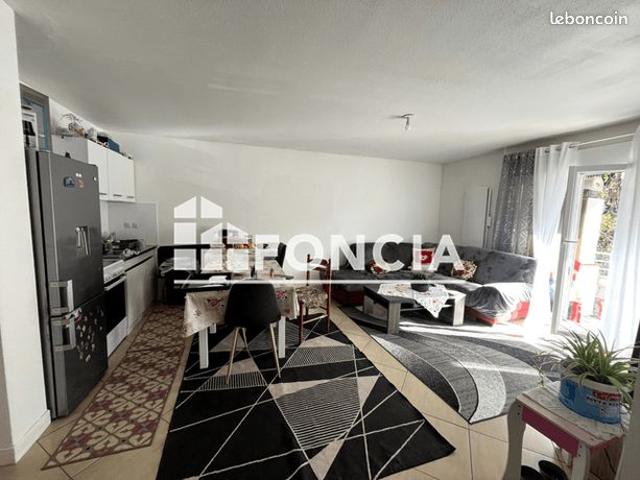 Appartement T4 avec 2 balcons et parking, vendu loué