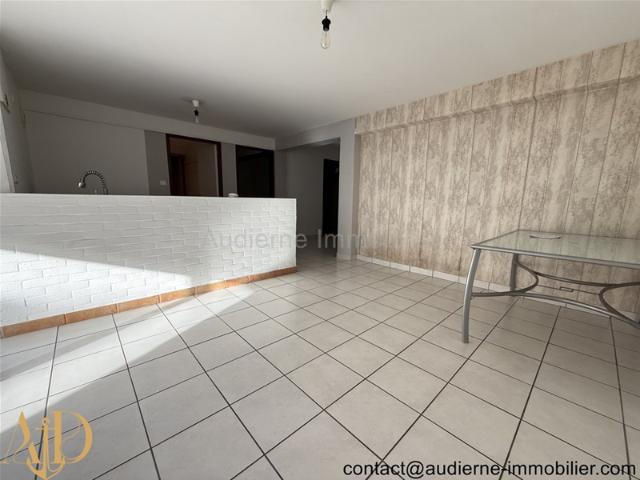 Appartement T4 de 76,9 m2 à proximité immédiate du centre