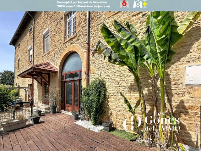 Appartement T4 de 100 M2 en pierre dorée avec terrasse et 2 places de parking