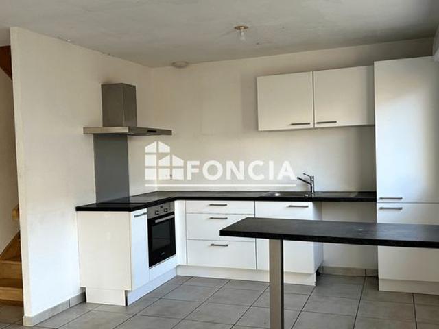 Appartement T4 en duplex avec stationnement et garage en sous sol