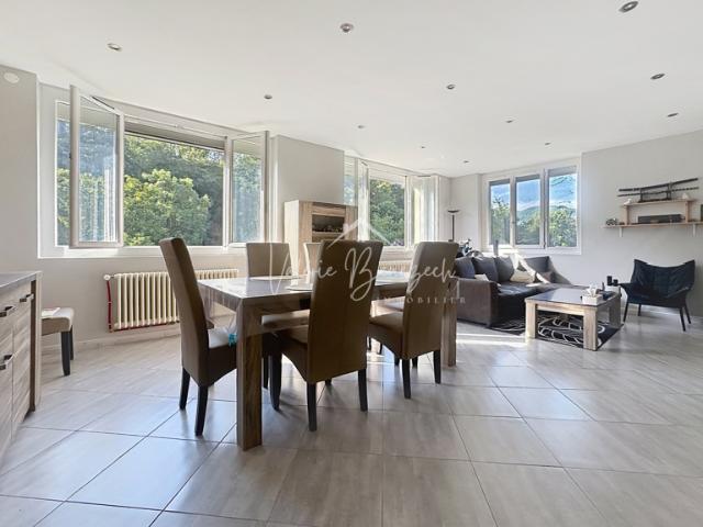 Appartement T4 rénové avec terrasse et garage