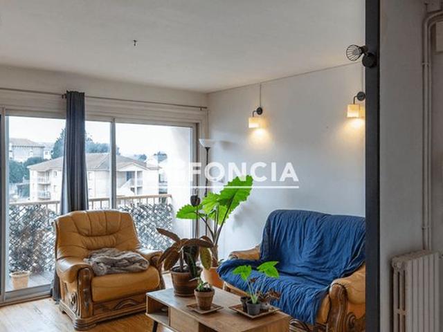 Appartement T4 rénové avec balcon et garage