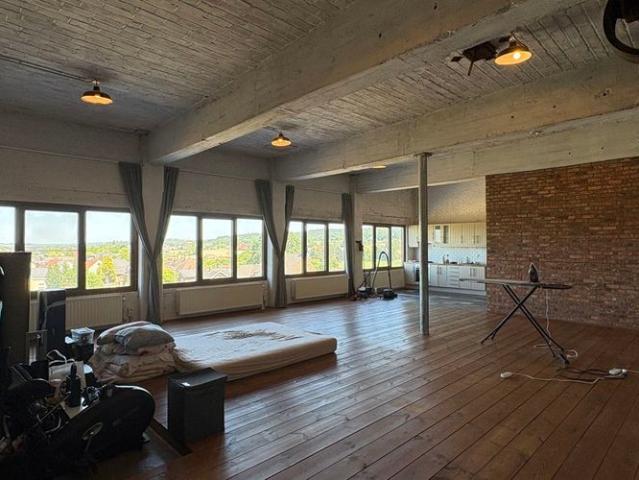 Appartement te huur in Ruien voor € 780 met 1 slaapkamer