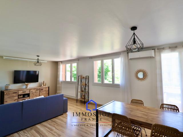 APPARTEMENT TRAVERSANT DE TYPE T4 DE 96 M2 + BALCON