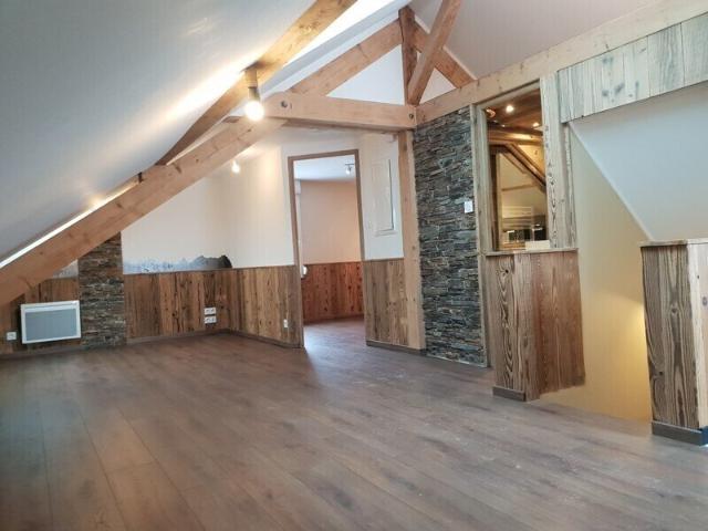 Appartement type F2 pierre et bois proche centre et pistes