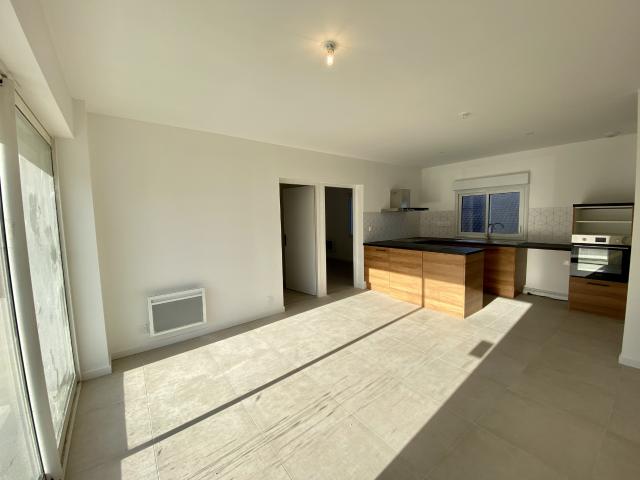 Appartement type 3 climatisé en rez de chaussée avec place de parking