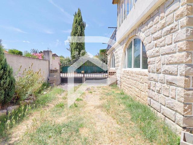 APPARTEMENT TYPE 3 AVEC JARDIN PRIVATIF DEUX PLACES DE PARKING