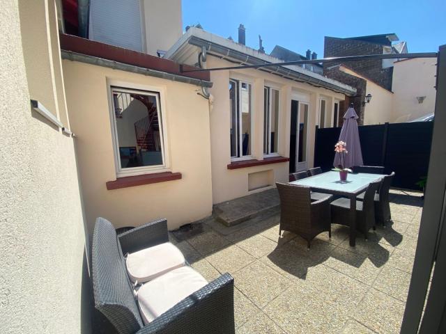 Appartement T5 triplex de 133 m² avec terrasse et place de parki