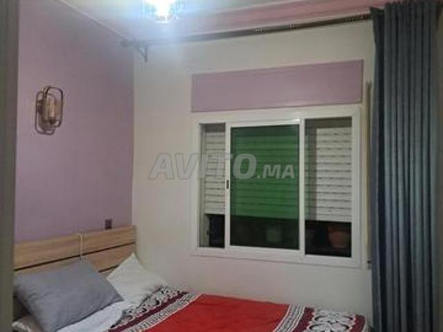 Appartement à vendre dans un immeuble sur la rue principale