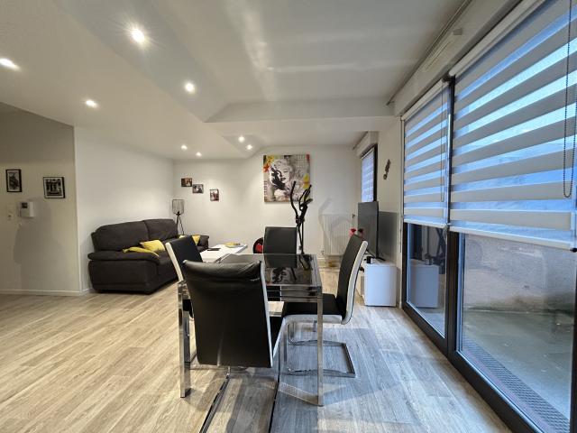 Appartement avec balcon et place de stationnement