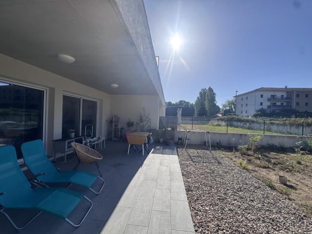 Appartement avec garage, jardin, terrasse et 3 chambres