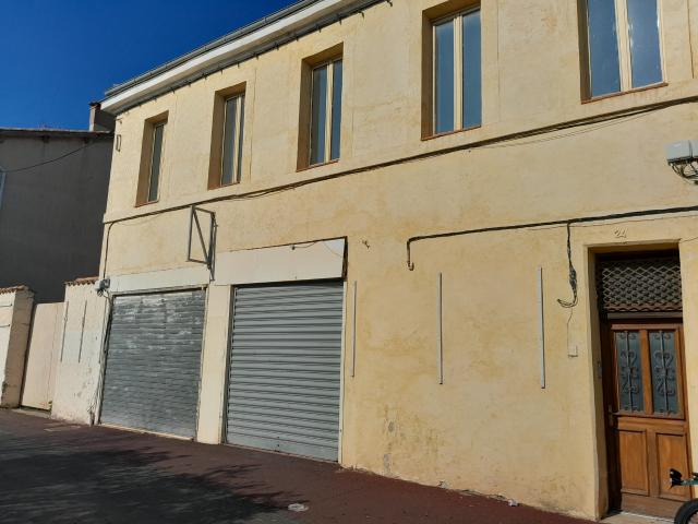 APPARTEMENT AVEC GRAND HANGAR ET TERRAIN D'AGREMENT