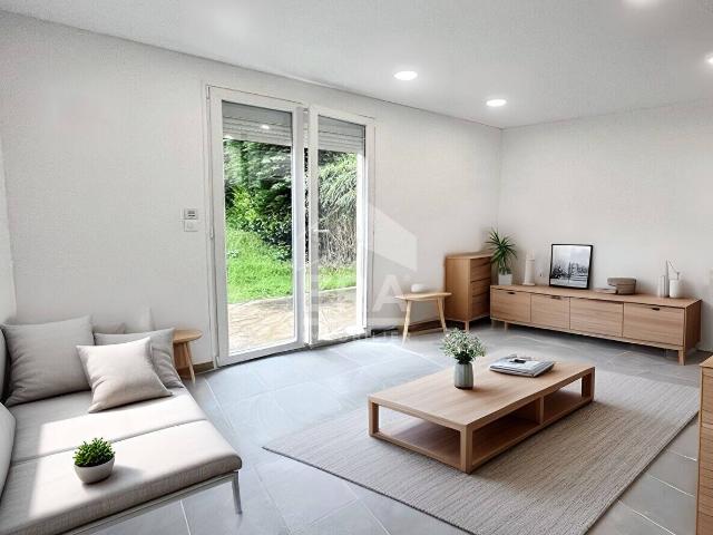 APPARTEMENT AVEC JARDIN
