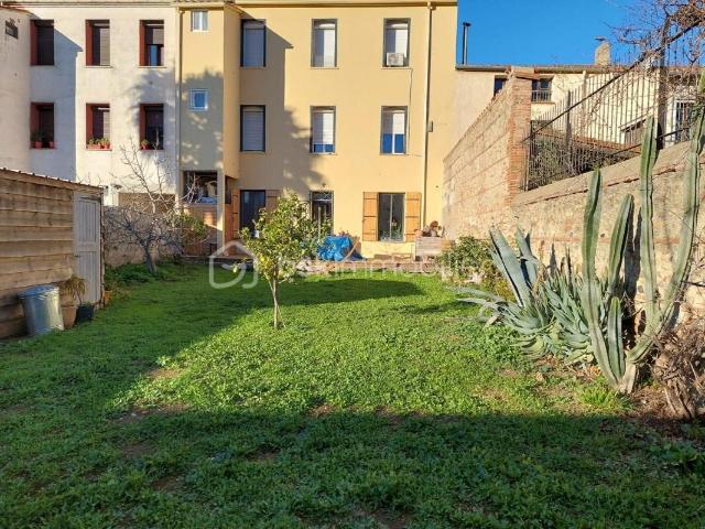 Appartement avec jardin privatif de 200m2 environ