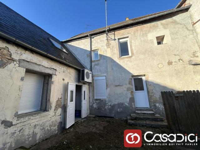 Appartement avec local commercial