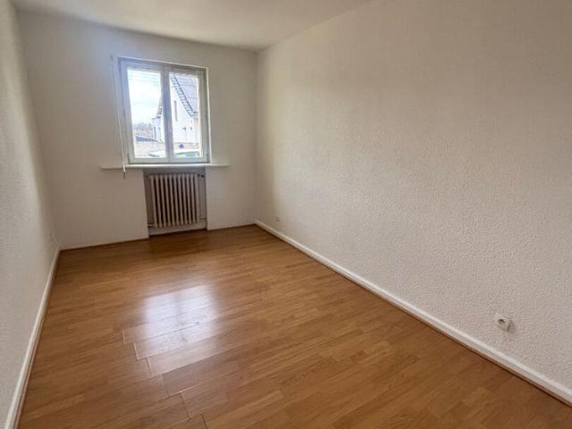Appartement avec petite cour privative et garage