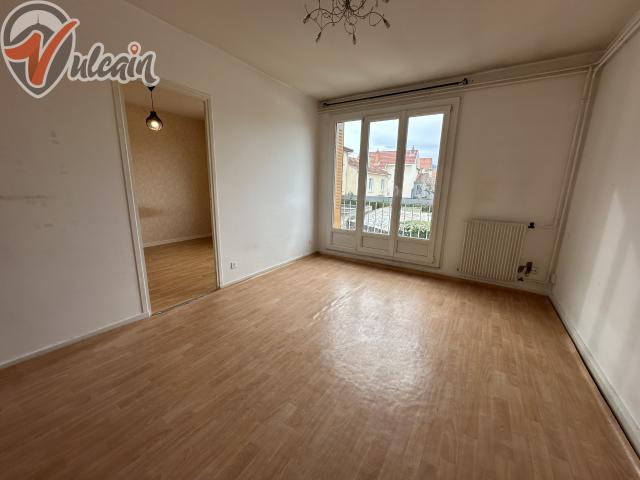 Appartement avec stationnement et cave