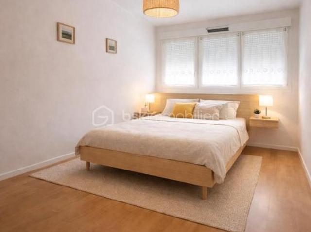 Appartement avec stationnement privé et box en cave
