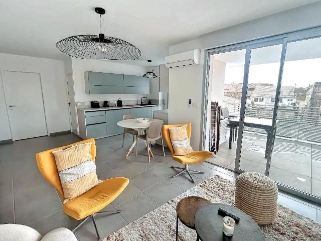 APPARTEMENT AVEC TERRASSE ET PARKING
