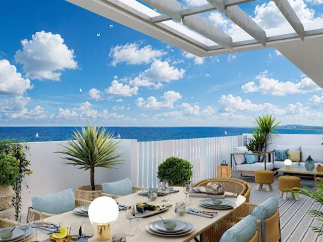 Appartement avec terrasse en bord de mer
