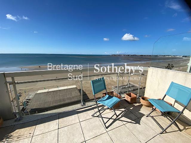 Appartement avec terrasse en bord de mer