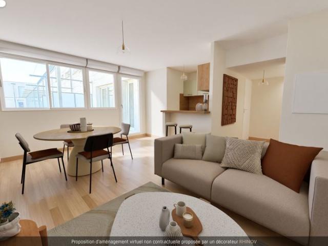 Appartement + cave + stationnement sous sol