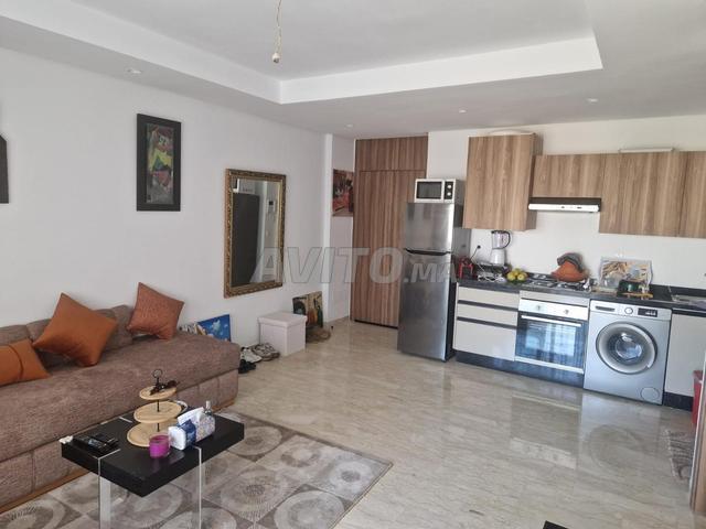 Appartement cosy avec terrasse et vue piscine