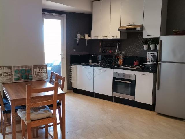 Appartement dans une residence en frond de mer