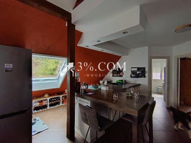 APPARTEMENT DE 46M2 SOUS COMBLES AVEC JARDIN PRIVATIF