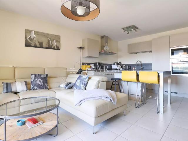Appartement de 85 m² avec balcon au centre d'Azieu