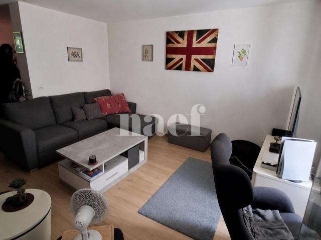 Appartement de 2.5 pièces au 1er étage avec jardin.
