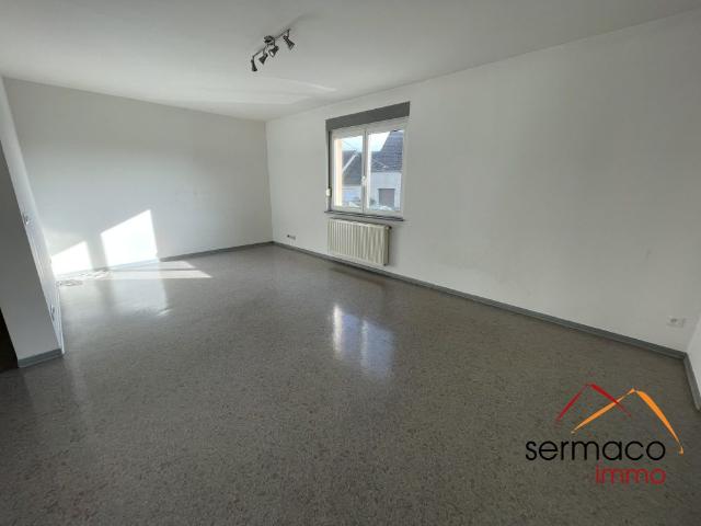 Appartement de type F3 avec balcon et stationnement