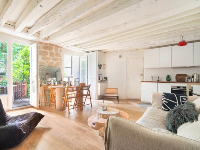 Appartement de caractère avec jardin au pied du Canal St Martin