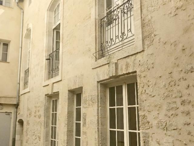 Appartement de plain pied avec 2 terrasses et place de parking