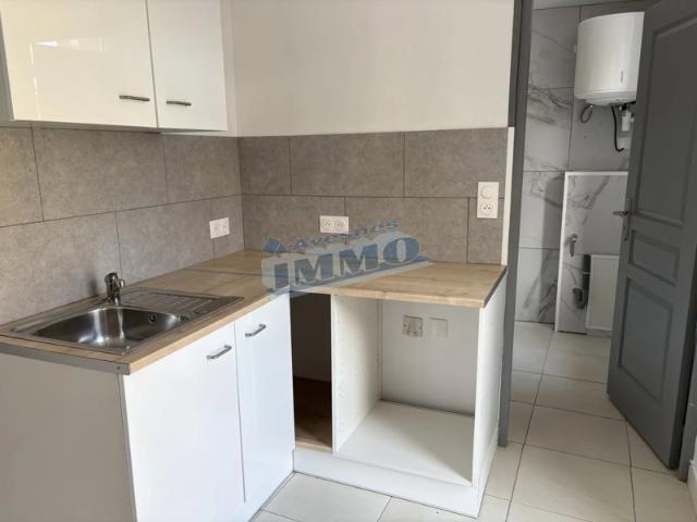 Appartement de plain pied avec grande cour à Avesnes le Comt