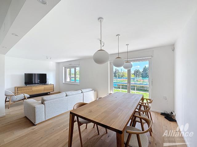 Appartement de standing avec jardin privatif, garage et parkings