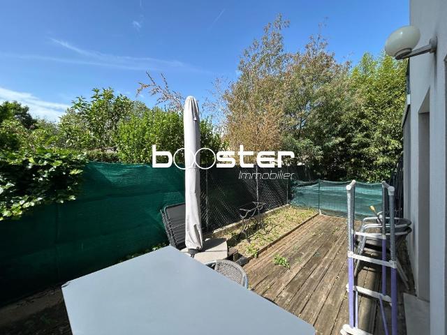 Appartement deux pièces en duplex avec jardinet