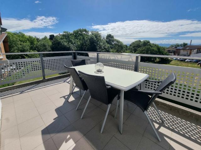 Appartement duplex lumineux avec balcon dans un cadre résidentiel privilégié