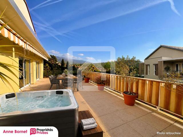 Appartement en toit terrasse avec 48 m2 d'extérieur, double garage, cave