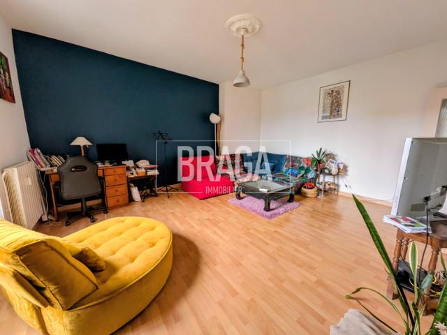 Appartement en HYPERCENTRE avec ascenseur/place de parking d