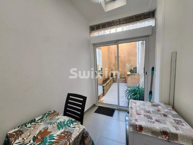 Appartement en RDC avec cour privative, calme et sans travaux