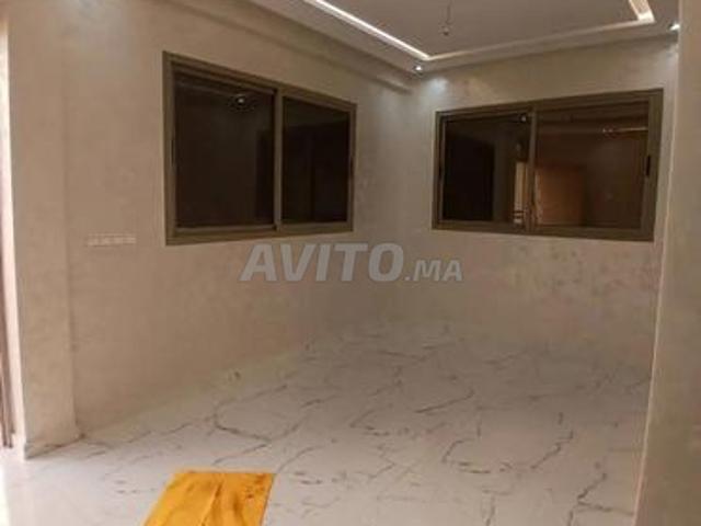 Appartement en rez de chaussée, deux façades, 68 m²