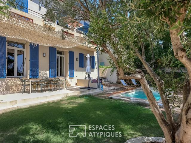 Appartement en rez de jardin avec piscine